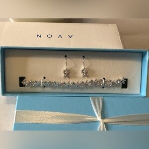 Brand New Brand new from 2005 Avon 2005 Floral Link Tennis Bracelet and Earrings